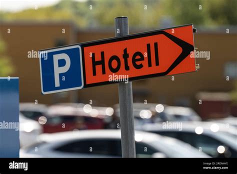 Hotel parking sign by a parking lot Stock Photo - Alamy