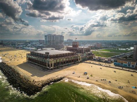 Drone Shot of a Building in Asbury Park Beach Boardwalk New Jersey by the Atlantic Ocean ...