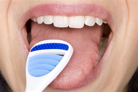 Importance Of Cleaning Your Tongue In Oral Hygiene - Odyssey Dental of Summerfield