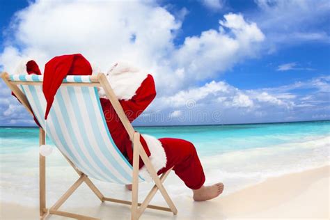 Santa Claus Sitting on Beach Chairs. Christmas Holiday Concept. Stock Image - Image of holiday ...