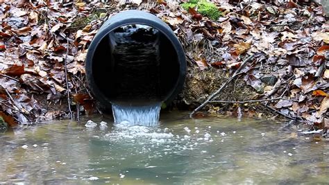 A Waste Water Drainage Runoff Pipe Re-routing The Water Flow And Polluting The Environment At ...