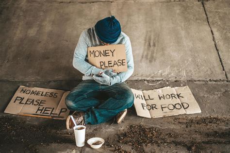 Beggar With Sign