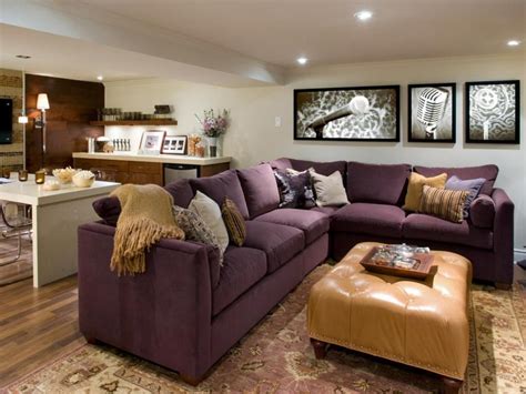 Family Room: Dark Purple Sectional Sofa And Beige Leather Ottoman ...