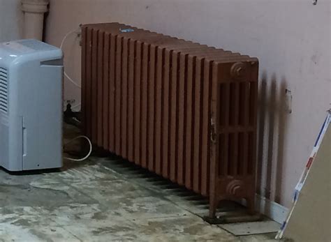 Basement radiator heating mystery — Heating Help: The Wall