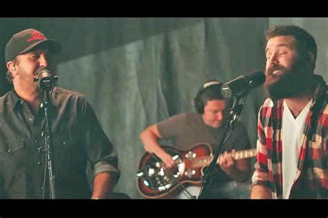 Jordan Davis, Luke Bryan Deliver Acoustic 'Buy Dirt' Music Video