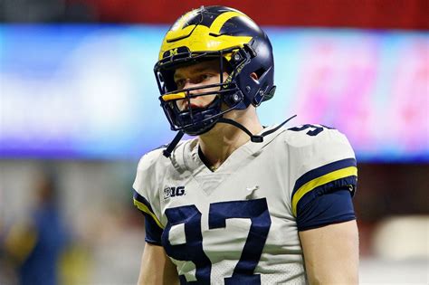 Michigan’s Aidan Hutchinson uses dad’s Big Ten rings as motivation ...