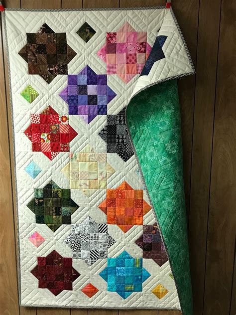 My very first , genuine scrappy quilt. 48 x 64 230 different fabrics My rule for this quilt was ...