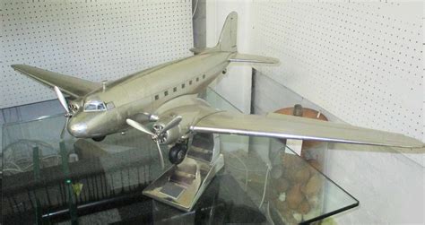 DC3 AIRCRAFT MODEL, in aluminium on stand, 98cm x 66cm x 38cm H.