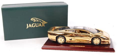 RARE JAGUAR XJ220 GOLD PLATED 1:18 SCALE DIECAST MODEL CAR