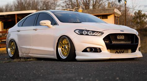 Ford Fusion with Custom Yellow Rims