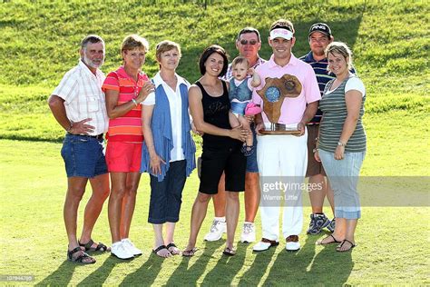 Louis Oosthuizen of South Africa poses with the trophy and his family ...