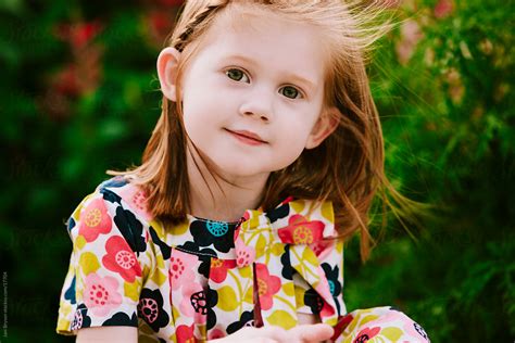 "Outdoor Portrait Of A Little Girl With Red Hair" by Stocksy Contributor "Jani Bryson" - Stocksy