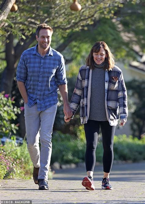 Jennifer Garner beams as she tenderly holds hands with boyfriend John ...