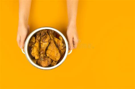 Young Girl Presenting Fried Chicken in a Saucepan on a Flat Lay ...