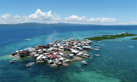 Enduring the tide: the flooded Philippine islands that locals won't ...