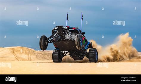 Sand Buggy racing in the sand dunes of the Qatari desert Stock Photo - Alamy