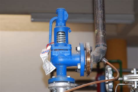 Marine boiler safety valve easing gear fitted on a ship boiler