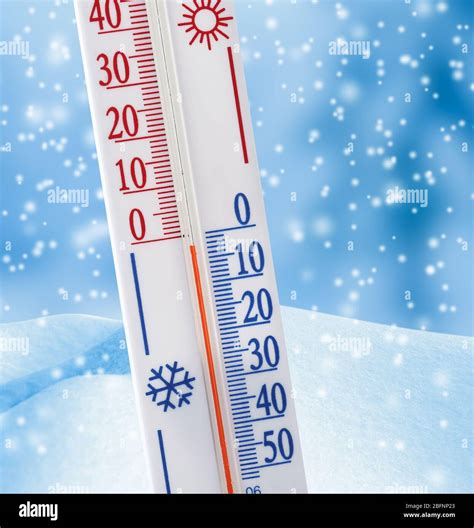 Thermometer registering temperature below zero outdoor Stock Photo - Alamy