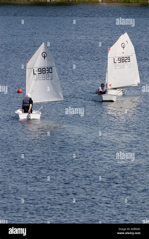 optimist sailing dinghies Stock Photo - Alamy