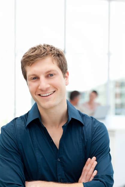 Premium Photo | Happy businessman in his office