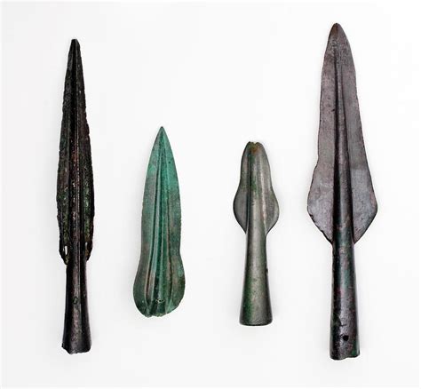 Four Bronze Age Spear Heads Photograph by Paul D Stewart