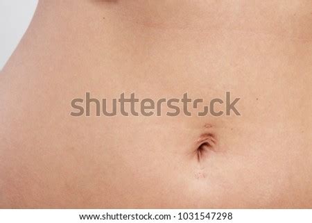 Navel Piercing Stock Images, Royalty-Free Images & Vectors | Shutterstock