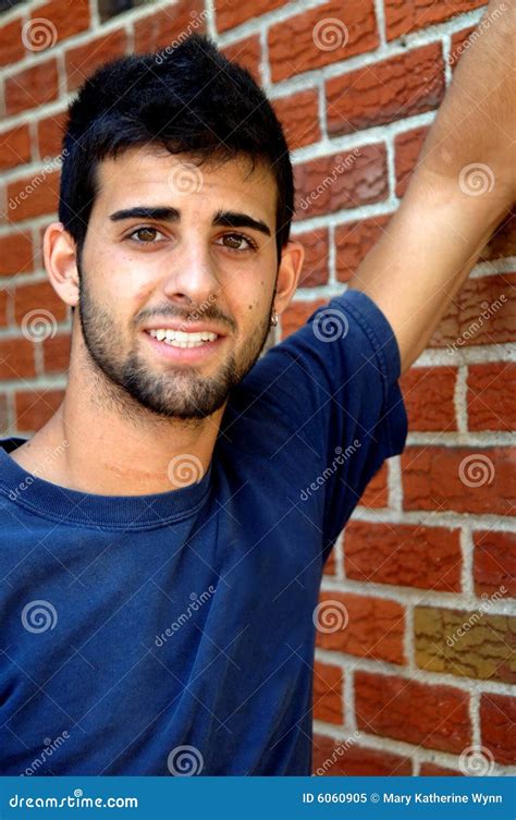 Smiling Handsome Man Walking Down The Stairs Royalty-Free Stock Photo | CartoonDealer.com #26813691