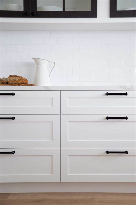 White #Shaker #style #drawers #with #black #bar #handles #in #this #classic #kitchen #| #Morris ...