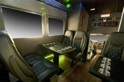 Front Interior Table Seating of 30 Passenger Limo Bus – Urbana ...