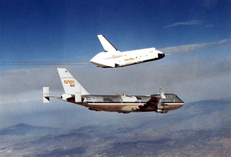 Space Shuttle Carries Vehicle