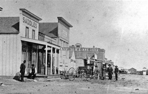 North side of Front Street looking east from Third Street, Dodge City, Kansas, during the early ...