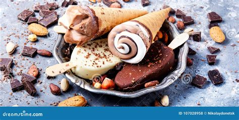 Chocolate Ice Cream with Nuts Stock Photo - Image of sweet, cone: 107028958