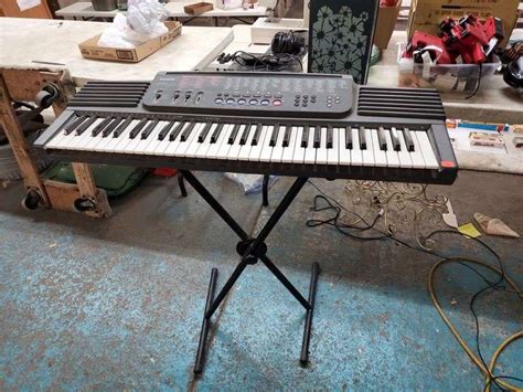 CASIO KEYBOARD & STAND - Isabell Auction