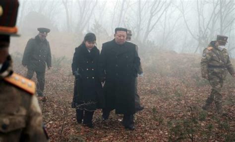 Kim Jong Un and daughter watch missile test simulating nuclear attack ...