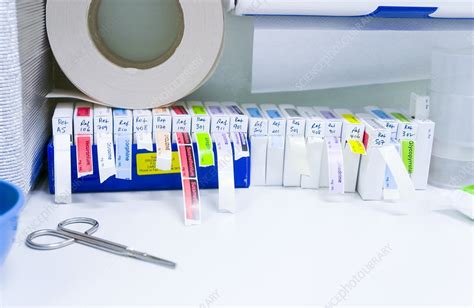 Syringe labels - Stock Image - M390/0650 - Science Photo Library