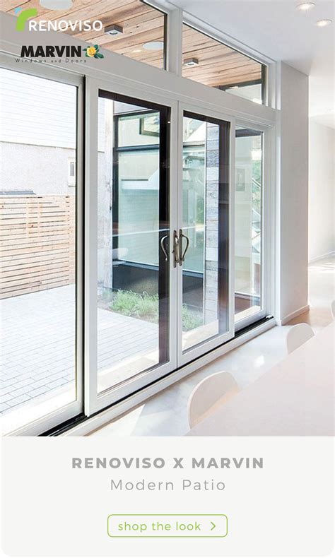 These gorgeous Marvin sliding patio doors create the perfect connection between the inside of ...