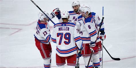 Rangers' Ryan Reaves brawls with Wild's Marcus Foligno, points to his ...