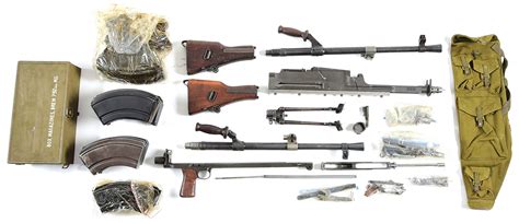 Lot Detail - BRITISH BREN MACHINE GUN PARTS KIT WITH SPARE BARREL AND 11 MAGAZINES.