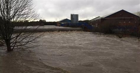 Residents forced to evacuate homes as River Irwell bursts its banks in ...