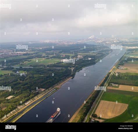 An aerial view of the river Amstel flowing into Amsterdam in the ...