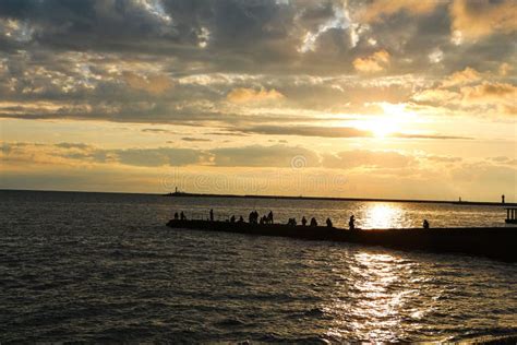 Fishing pier on the sunset stock photo. Image of golden - 95410602