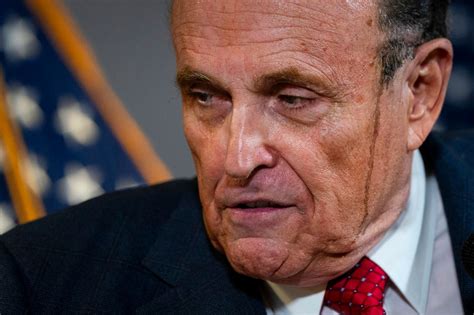 Rudy Giuliani has hair dye streak down face in sweaty press conference ...