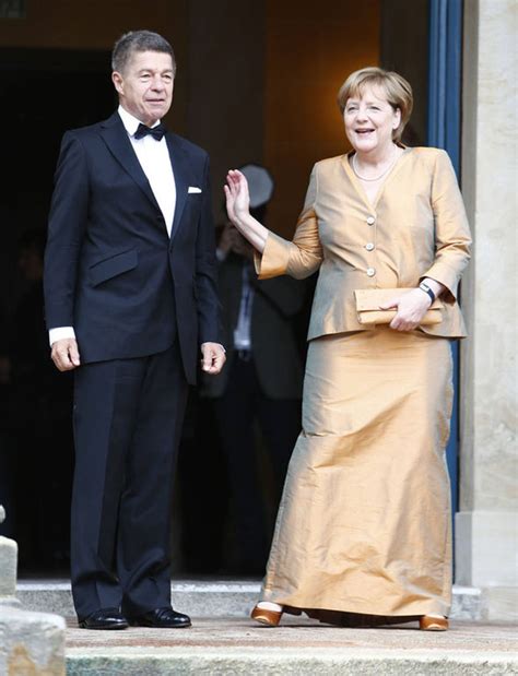 Angela Merkel steps out in gold suit with husband Joachim Sauer ...