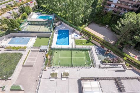 Premium Photo | Tennis courts paddle tennis courts and residential ...