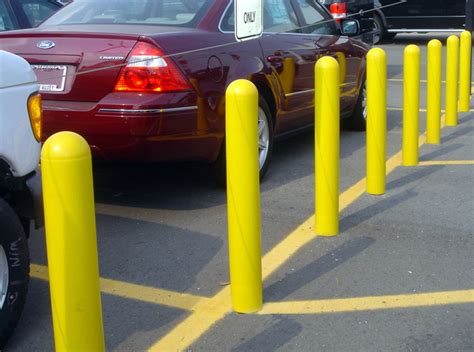 Plastic Bollard Covers Easy to Install & Variety Of Colors In Stock - J&P Site Experts