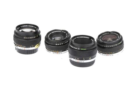 Lot 440 - Four Olympus OM Lenses,