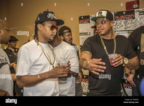 Curtis Young, son of Dr. Dre, visits DJ Quik backstage before his Stock ...