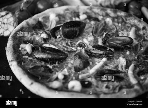 delicious italian pizza with fresh seafood Stock Photo - Alamy