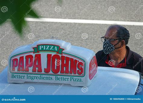 Papa John`s Pizza Sign on Car and Delivery Driver Editorial Image ...