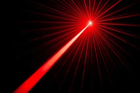 Red laser beams light effect on black background photo. | LAUNCH